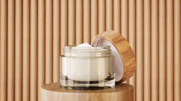 Glass jar of cream with an open wooden lid. Wooden background. Organic natural cosmetics.